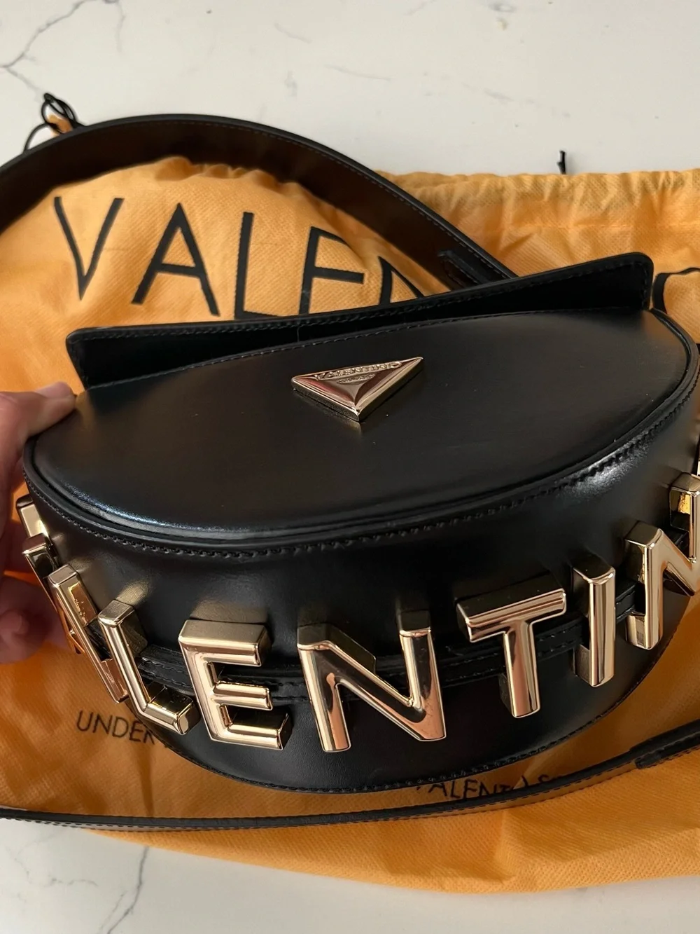 Valentino Black Leather Half-Moon Crossbody with Gold Accents